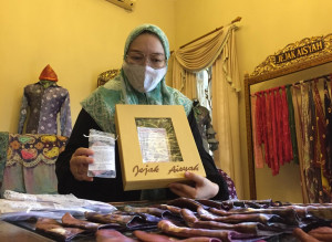 Angel Eva Christine, Mualaf Promosikan Jumputan Khas Palembang hingga ke Amerika