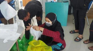 Mahasiswa KKN Unismuh Palu Bantu Kebutuhan Warga Pasien Isoman