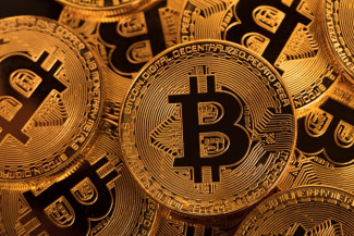 Transaksi Pakai Uang Kripto, Bagaimana Hukumnya?