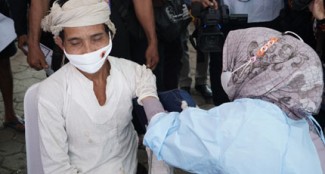 Pemerintah Pastikan Masyarakat Adat Dapat Hak Vaksin