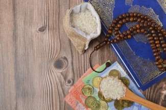 Hukum dan Cara Membayar Zakat Fitrah Bagi Pekerja Rantau yang Tidak Mudik